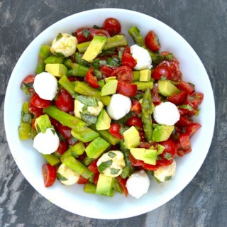 Asparagus, Tomato and Avocado Salad in a creamy lemon vinaigrette! Healthy, quick and delicious! www.maebells.com