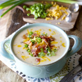 Easy Potato Soup! Top with bacon cheddar and green onions for the ultimate comfort food!