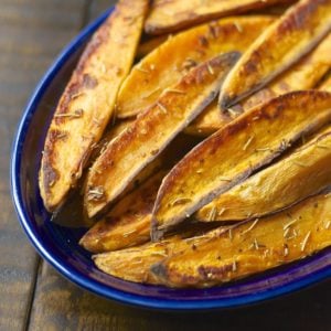 Rosemary Garlic Sweet Potato Wedges are packed with flavor and baked until crisp on the outside and tender on the inside!