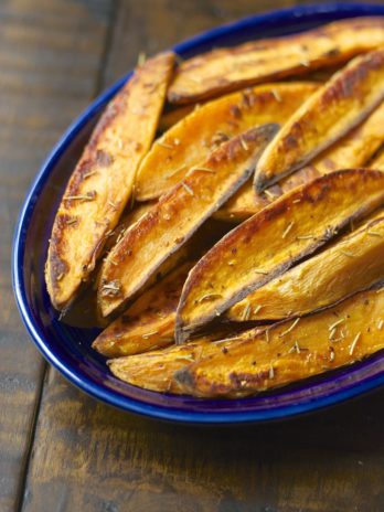 Rosemary Garlic Sweet Potato Wedges are packed with flavor and baked until crisp on the outside and tender on the inside!