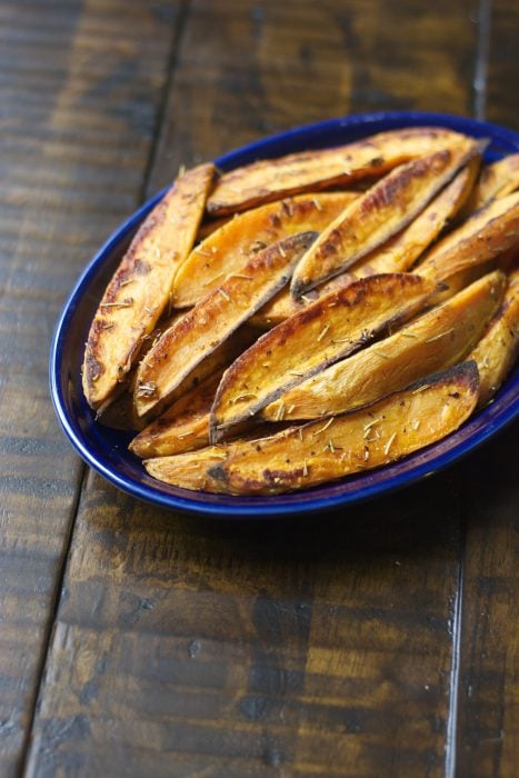 Rosemary Garlic Sweet Potato Wedges are packed with flavor and baked until crisp on the outside and tender on the inside!