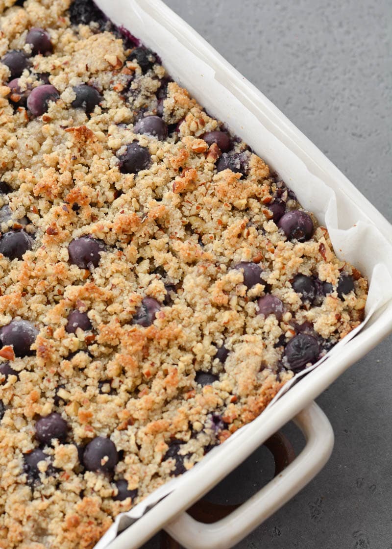 A pan of healthy blueberry bars with crumble topping