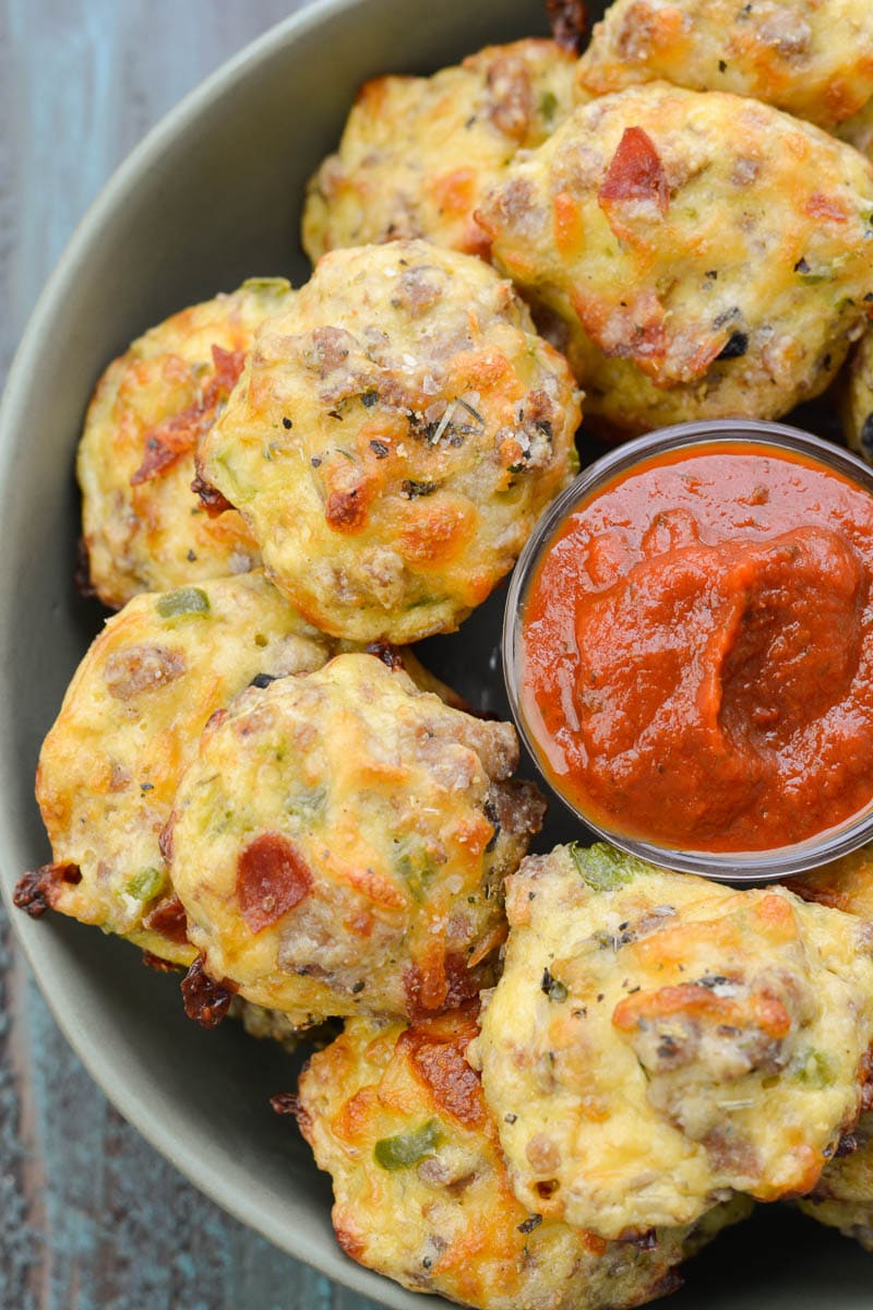 Try these Supreme Pizza Puffs loaded with sausage, pepperoni, bell pepper, onion and cheese! These keto pizza bites are about 1 net carb each making them a great dinner or easy appetizer! 