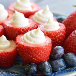 These Cheesecake Stuffed Strawberries look fancy, but they're a breeze to make! Perfect for picnics and potlucks! 