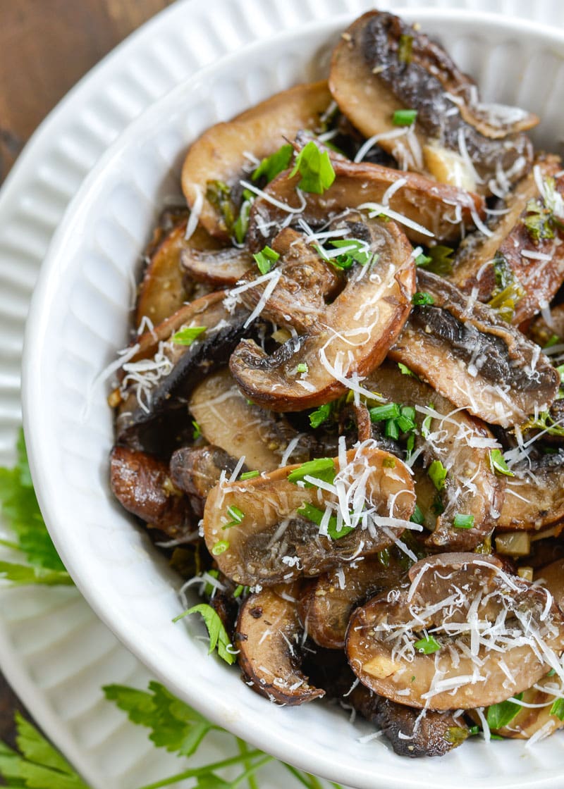 These Italian Baked Mushrooms are smothered in a delicious butter, garlic, and herb sauce! This is the perfect easy, low-carb side dish recipe!
