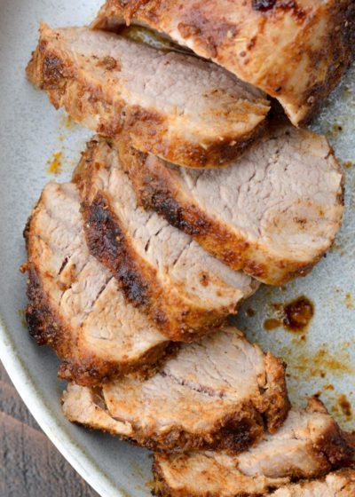 This easy Smoked Pork Tenderloin is flavored with the most amazing homemade dry rub, then slow cooker to perfection on the grill!