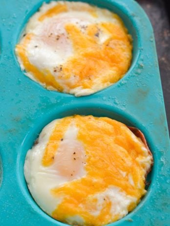 Try these Easy Cheddar Baked Eggs for a quick, low carb breakfast! You only need four basic ingredients to make this protein packed breakfast recipe!