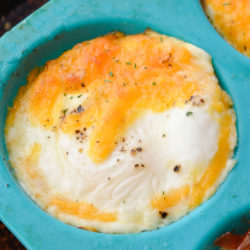 Try these Easy Cheddar Baked Eggs for a quick, low carb breakfast! You only need four basic ingredients to make this protein packed breakfast recipe!