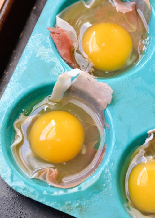 Try these Easy Cheddar Baked Eggs for a quick, low carb breakfast! You only need four basic ingredients to make this protein packed breakfast recipe!