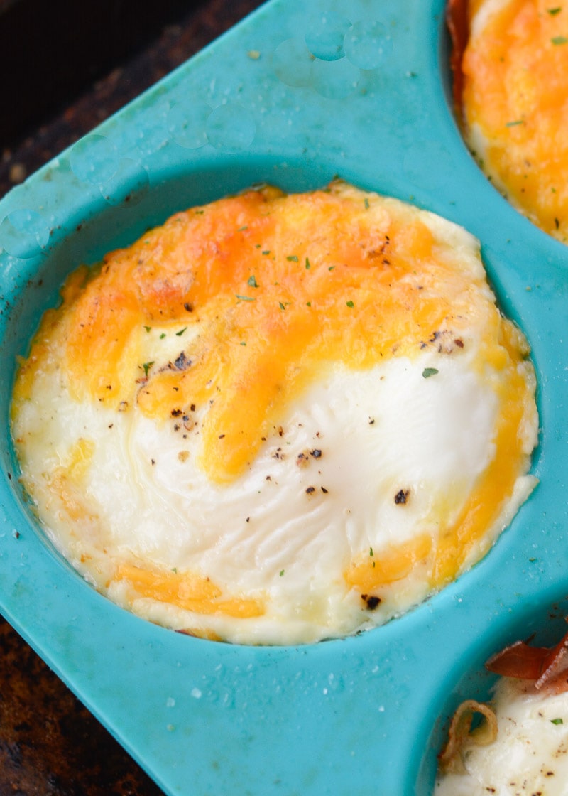 Try these Easy Cheddar Baked Eggs for a quick, low carb breakfast! You only need four basic ingredients to make this protein packed breakfast recipe!