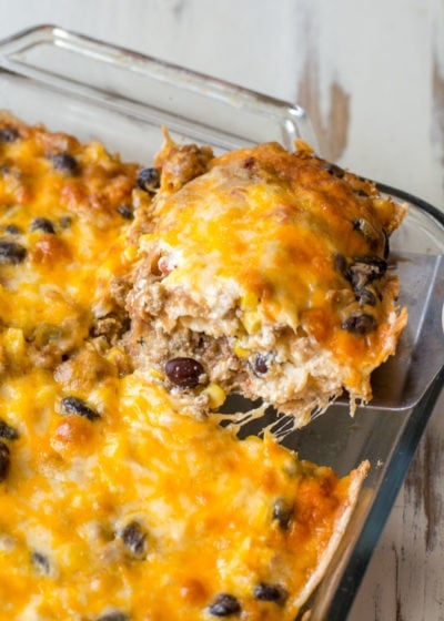 Need an easy recipe to feed a crowd? This Taco Lasagna is loaded with taco meat, black beans, corn, and cheese. Perfect for busy nights!