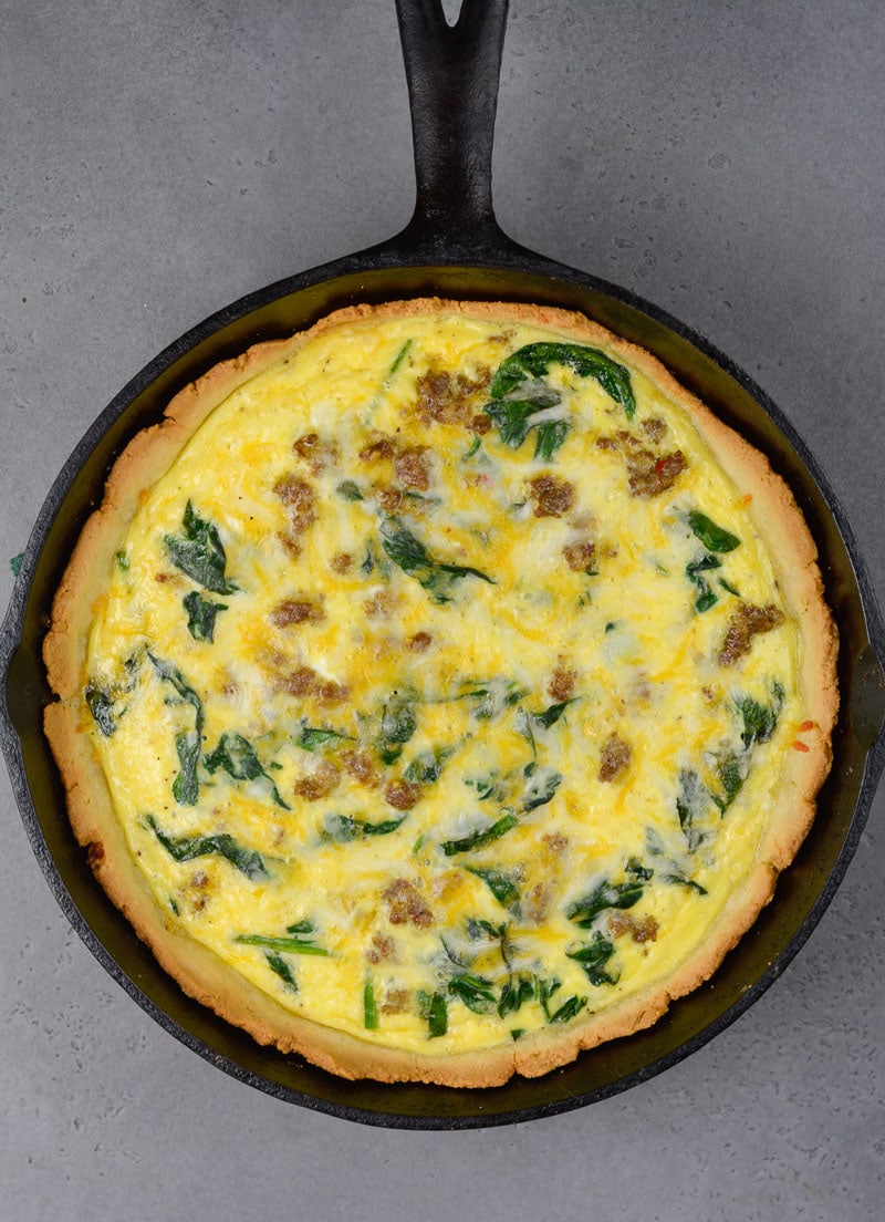 overhead view of a keto quiche in a cast iron skillet 