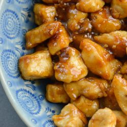 My easy Spicy Kung Pao Chicken recipe is way better than take out, and completely gluten free! Your family will love this flavorful kung pao chicken.