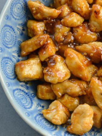 My easy Spicy Kung Pao Chicken recipe is way better than take out, and completely gluten free! Your family will love this flavorful kung pao chicken.