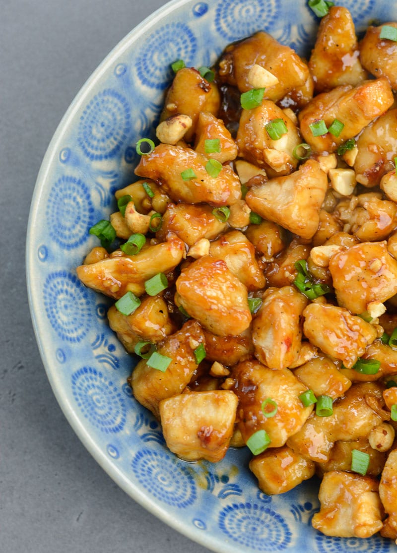 My easy Spicy Kung Pao Chicken recipe is way better than take out, and completely gluten free! Your family will love this flavorful kung pao chicken.