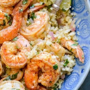 This Cilantro Lime Shrimp and Cauliflower Rice is low calorie, low carb, keto-friendly and packed with flavor! This is a 20 minute meal your entire family will love!