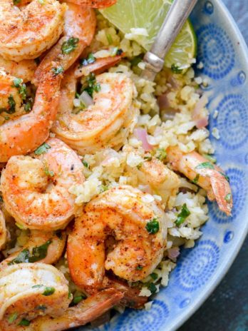This Cilantro Lime Shrimp and Cauliflower Rice is low calorie, low carb, keto-friendly and packed with flavor! This is a 20 minute meal your entire family will love!