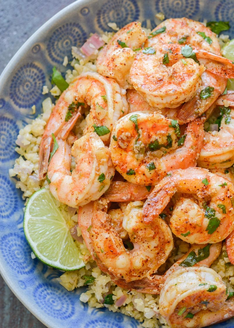 This Cilantro Lime Shrimp and Cauliflower Rice is low calorie, low carb, keto-friendly and packed with flavor! This is a 20 minute meal your entire family will love!