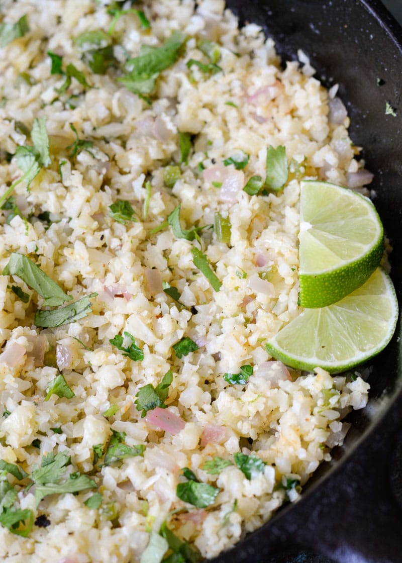 This Cilantro Lime Cauliflower Rice is low calorie, low carb, keto-friendly and packed with flavor! This is a 20 minute meal your entire family will love!