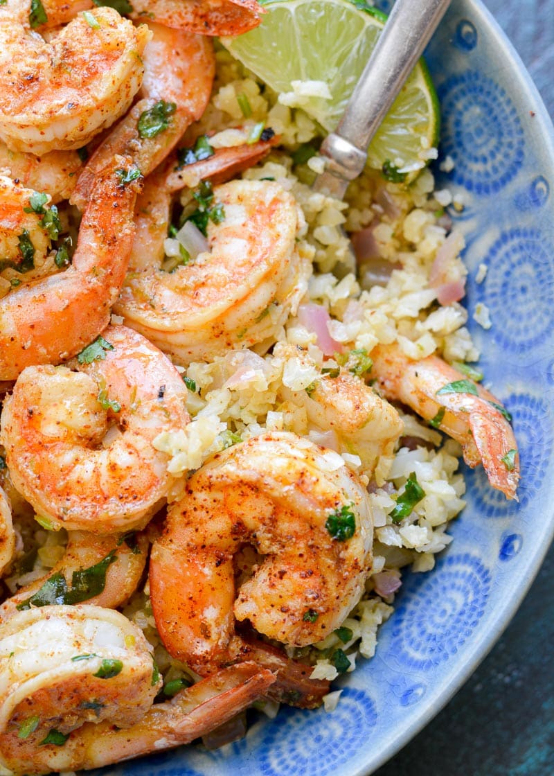 This Cilantro Lime Shrimp and Cauliflower Rice is low calorie, low carb, keto-friendly and packed with flavor! This is a 20 minute meal your entire family will love!