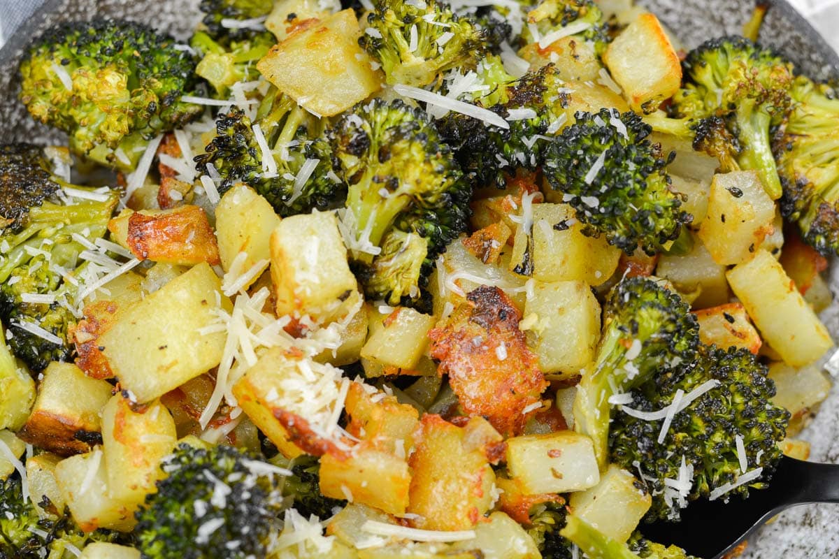 These Lemon Dijon Roast Potatoes and Broccoli are the ultimate one pan side dish. It is impressive enough for guests and easy enough for a hearty weeknight meal!