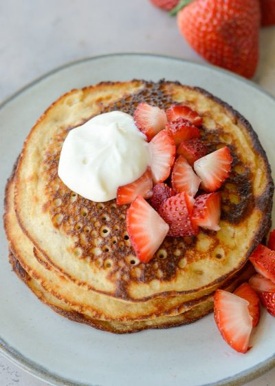 These Strawberry Pancakes are topped with a sweet vanilla cream cheese glaze! These low carb almond flour pancakes are the perfect keto breakfast! 
