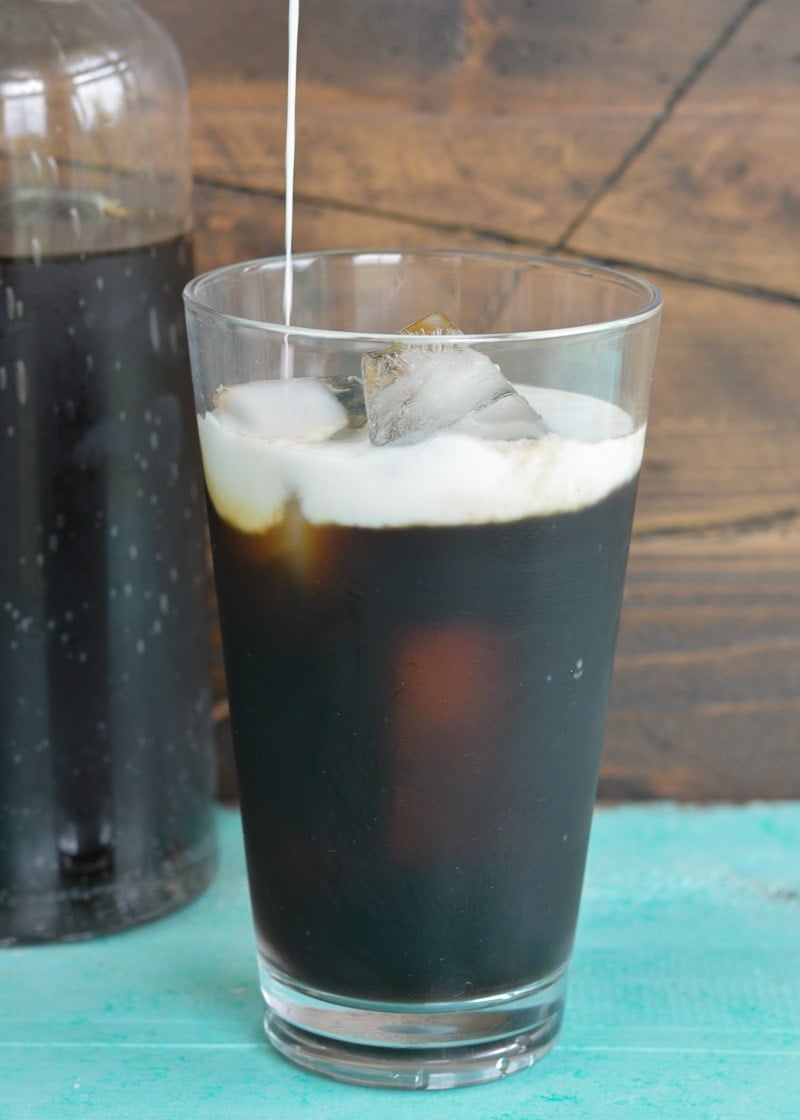 This Simple Iced Coffee is made using cold brew coffee. Learn just how easy it is to make a perfect large batch of iced coffee for a fraction of the coffee house price!