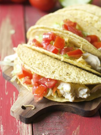 These Slow Cooker Zesty Chicken Tacos are slow simmered in a mixture of spices of salsa verde! An easy, healthy dinner your entire family will love!