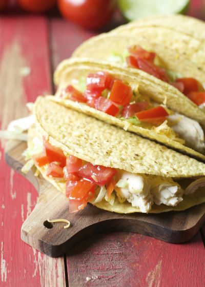 These Slow Cooker Zesty Chicken Tacos are slow simmered in a mixture of spices of salsa verde! An easy, healthy dinner your entire family will love!