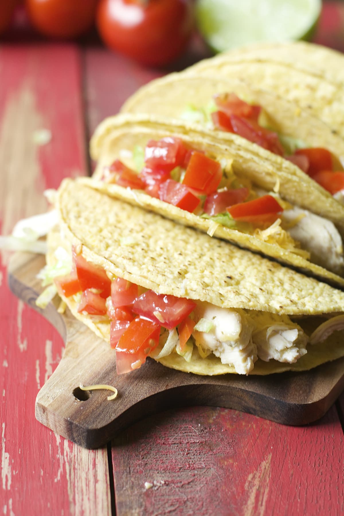 These Slow Cooker Zesty Chicken Tacos are slow simmered in a mixture of spices of salsa verde! An easy, healthy dinner your entire family will love!