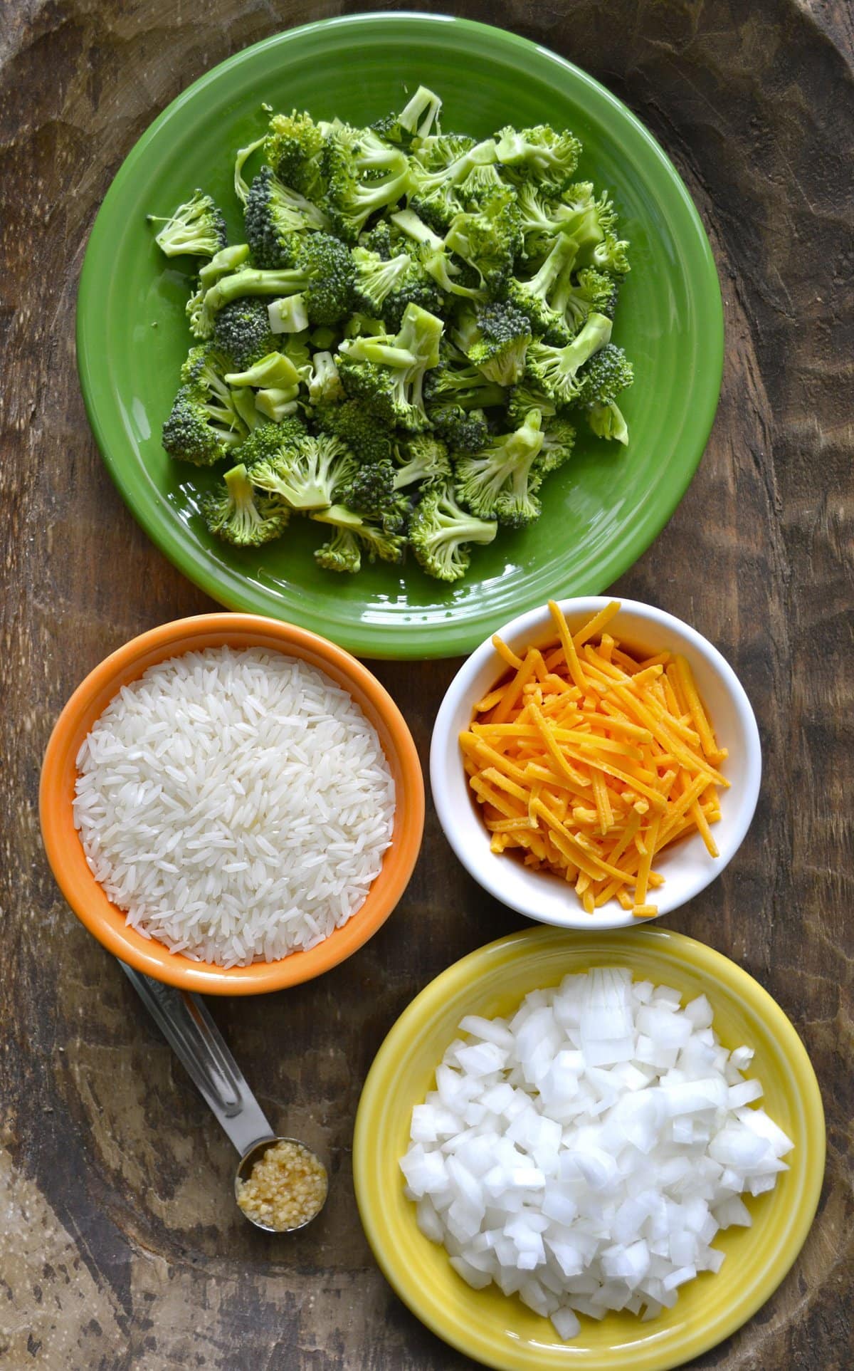 This Cheesy Broccoli Rice Casserole is the perfect one pan side dish that is loaded with tender broccoli and sharp cheddar cheese. This easy gluten-free side is perfect for even your pickiest eaters!