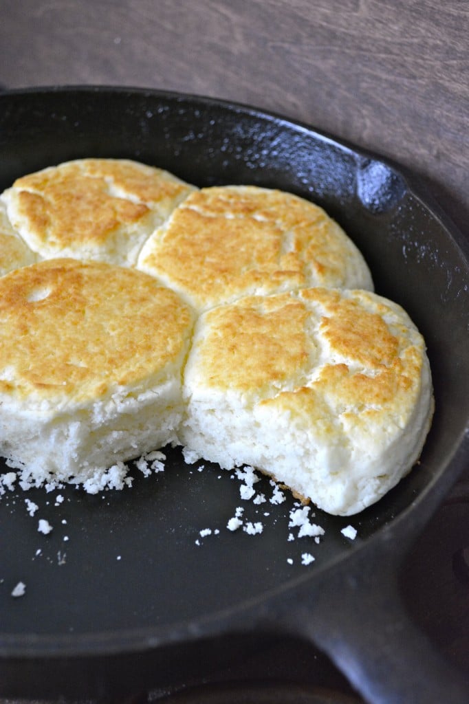 four bisquick buttermilk biscuits in a cast iron skillet 