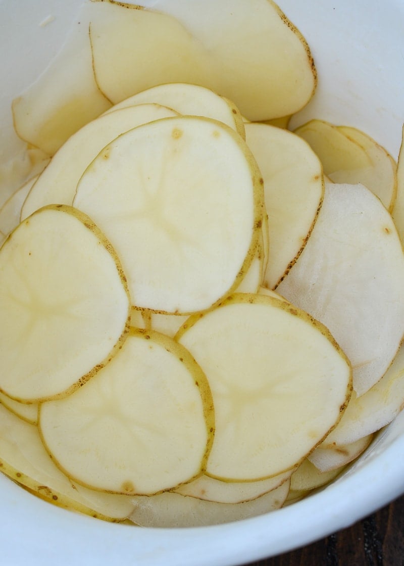 Learn how to make deliciously crispy, crunchy Homemade Potato Chips! 