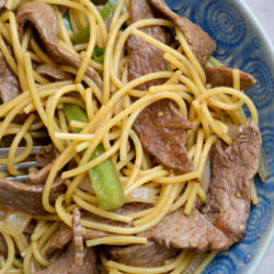 Easy steak lo mein in a bowl with gluten-free noodles