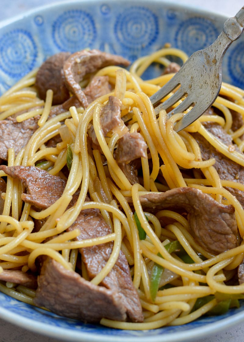 This easy Steak Lo Mein comes together in just 30 minutes! Spicy noodles, steak, and veggies all come together for a hearty dinner the whole family will love!