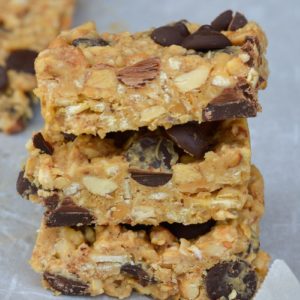 This easy Grain Free Granola Bar recipe is the perfect no bake snack! Loaded with fruit, nuts and protein rich peanut butter this is the perfect heathy snack! 