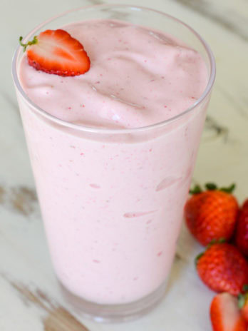 a photo of a glass of strawberry banana smoothie