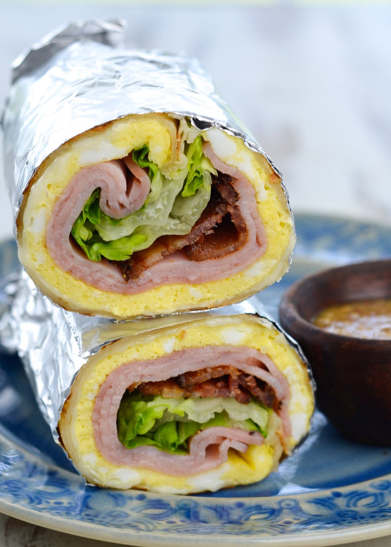 This Bacon, Ham, and Egg Wrap with Honey Dijon Sauce is a hearty breakfast wrap that your whole family will love!