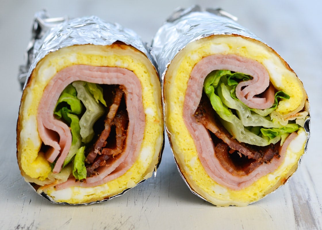 This Bacon, Ham, and Egg Wrap with Honey Dijon Sauce is a hearty breakfast wrap that your whole family will love!