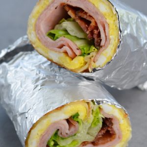 This Bacon, Ham, and Egg Wrap with Honey Dijon Sauce is a hearty breakfast wrap that your whole family will love!