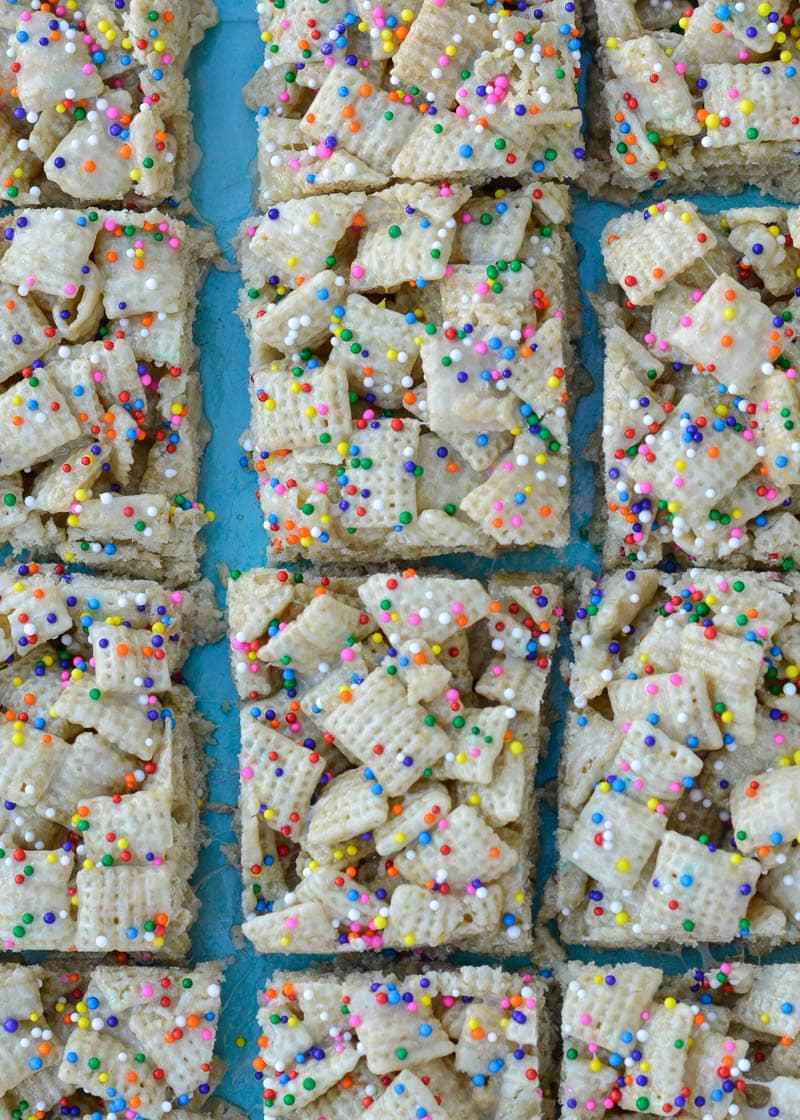 These five ingredient Cake Batter Bars are a sweet gluten free treat! These easy cereal snack bars are the perfect school snack for your kiddos!