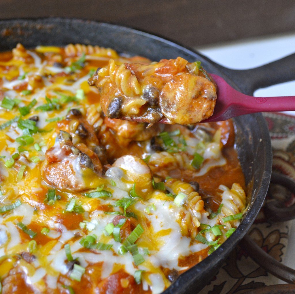 This easy One Pan Pasta is a quick, 30-minute meal that is packed with Spicy Sausage and Black Beans! The perfect one-dish family dinner!