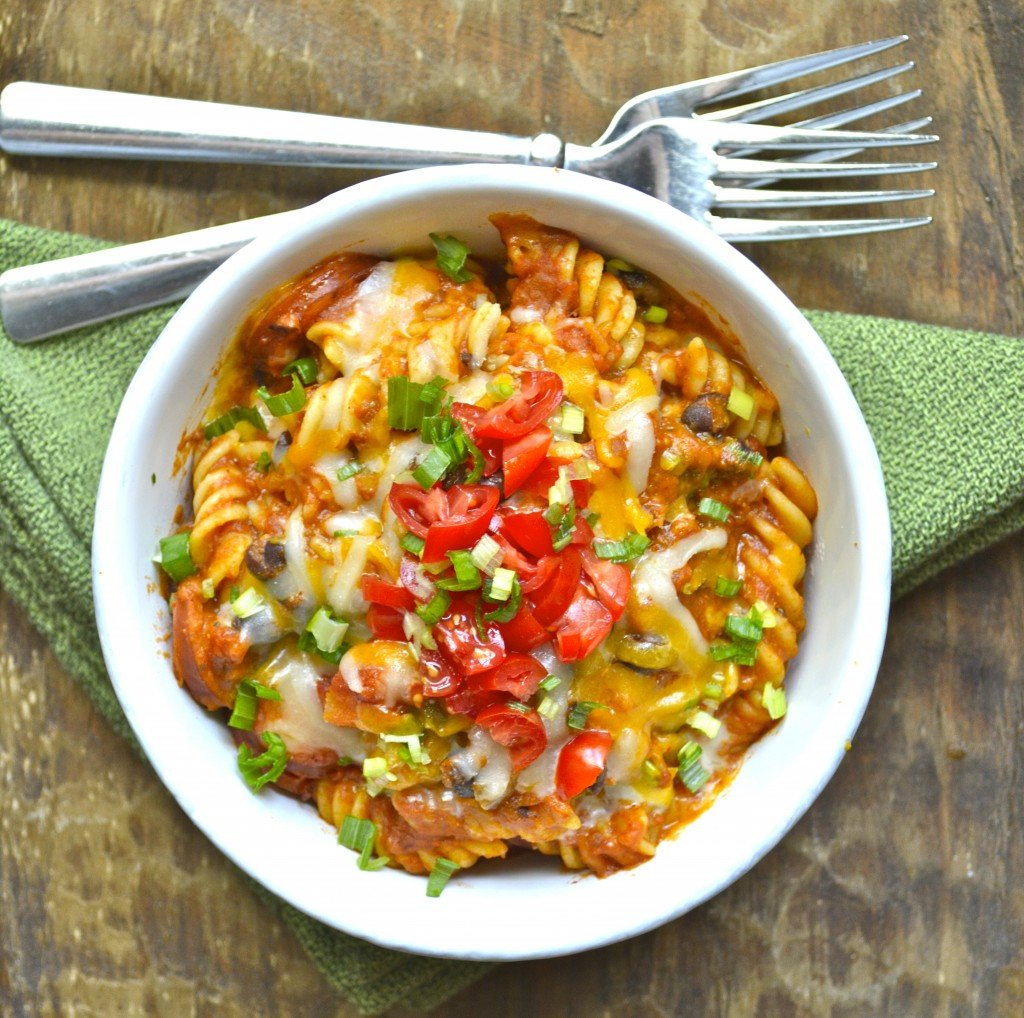 This easy One Pan Pasta is a quick, 30-minute meal that is packed with Spicy Sausage and Black Beans! The perfect one-dish family dinner!