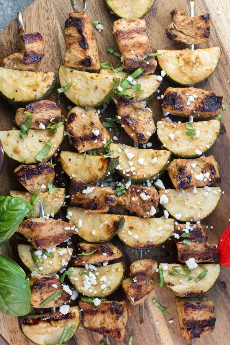 These Easy Grilled Chicken and Zucchini Skewers are keto, low carb and gluten free! These summer kabobs are perfect on their own or on top of a big greek salad! #keto #mealprep