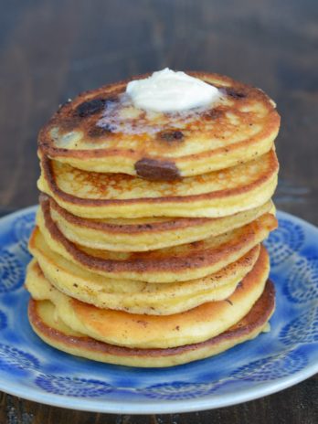 These Chocolate Chip Protein Pancakes are lightened up and healthier than traditional pancakes! 