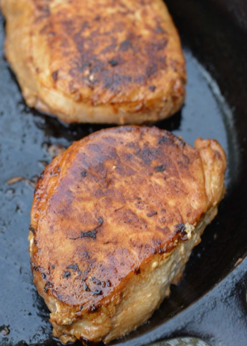 To start these Asian Pork Chops with Sesame Broccoli, first perfectly sear your pork in a super hot pan.