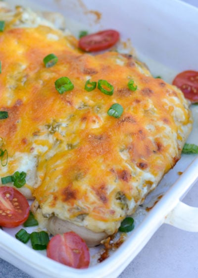 Try my favorite Cheesy Chicken Bake for an easy one pan, keto-friendly dinner recipe! Each serving of chicken is smothered with green chiles, cheese and ranch for less than 4 net carbs! 