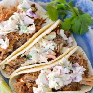  These Slow Cooker Pork Carnitas are a cinch to make and totally addictive! Top them with fresh jalapeño slaw for the ultimate easy, healthy meal!  