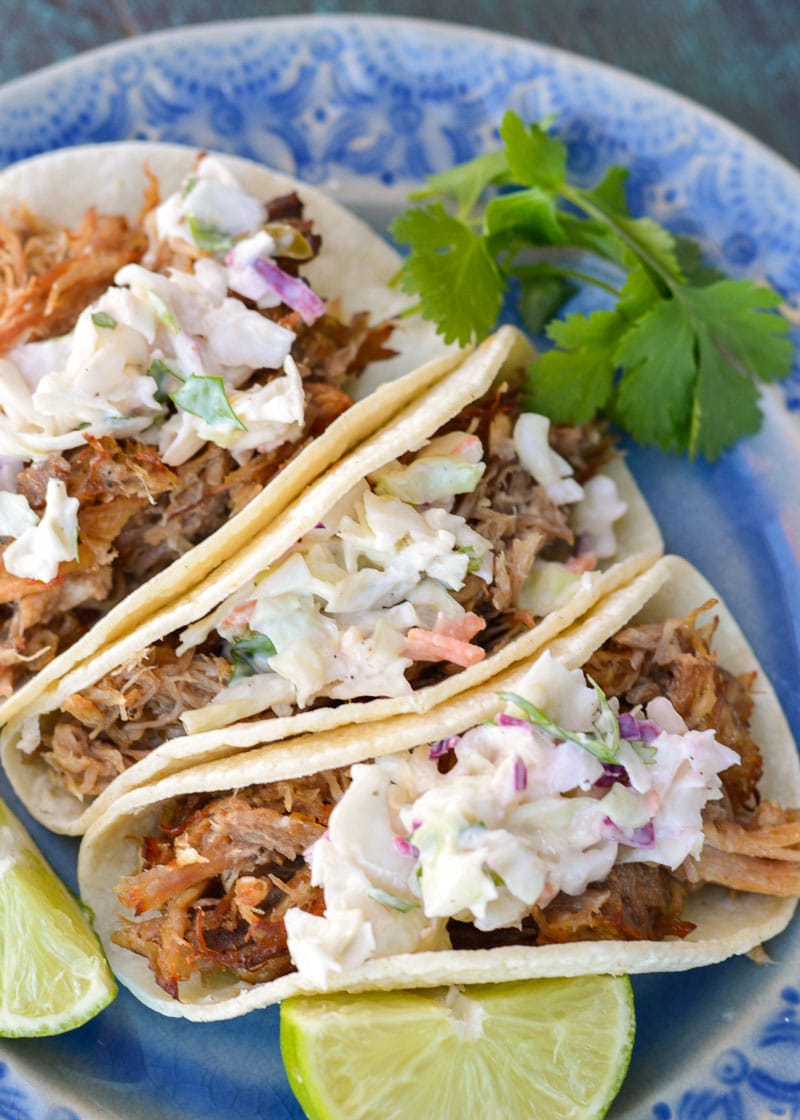  These Slow Cooker Pork Carnitas are a cinch to make and totally addictive! Top them with fresh jalapeño slaw for the ultimate easy, healthy meal!  