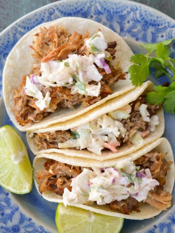  These Slow Cooker Pork Carnitas are a cinch to make and totally addictive! Top them with fresh jalapeño slaw for the ultimate easy, healthy meal!  